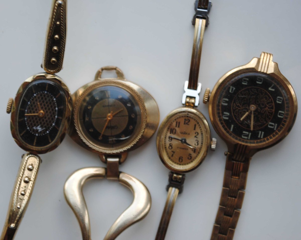 Позолоченные часы луч